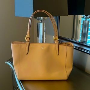 Pale pink leather Tory Burch Handbag with gold hardware, matching dust bag